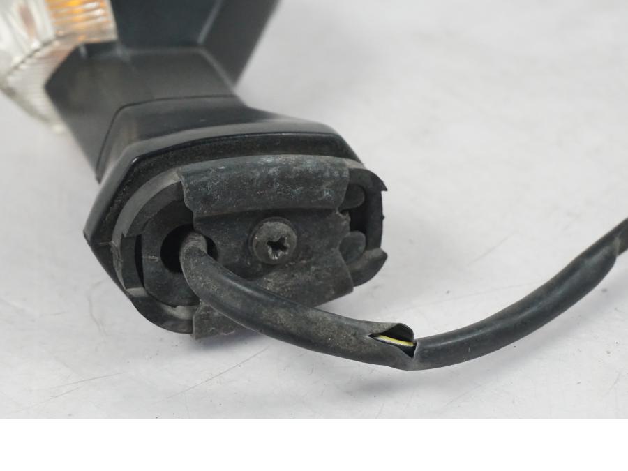 Vänster sida på Blinkers från en Kawasaki ER-6N ABS -2010 motorcykel.