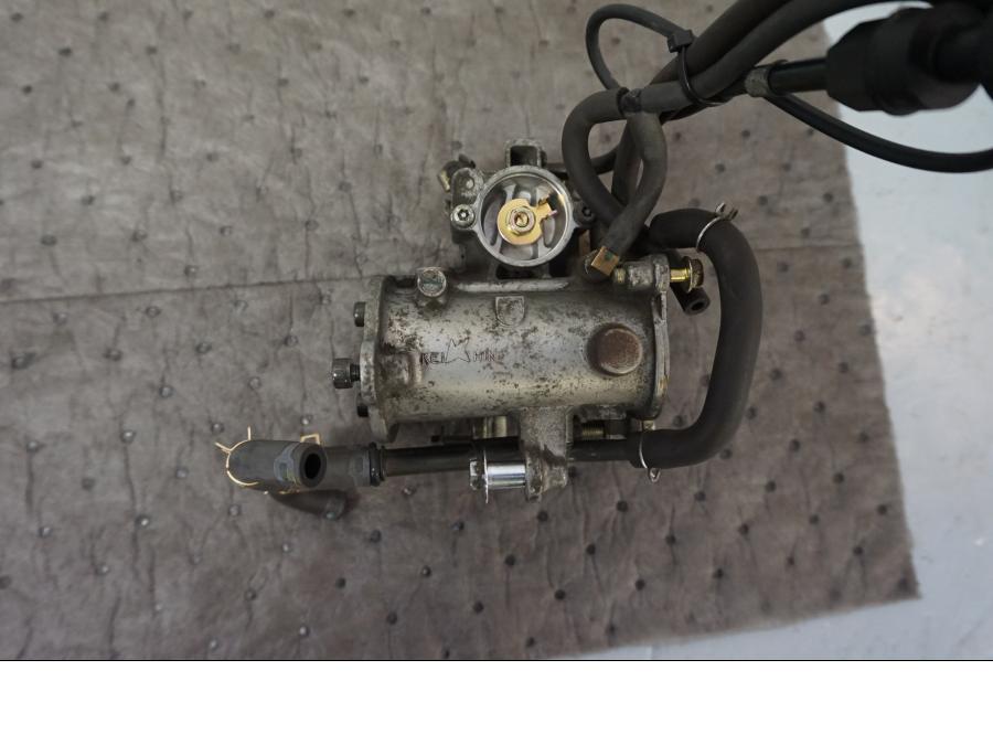 Vänster sida på Spjällhus från en Kawasaki VN 1500 Mean Streak -2003 motorcykel.