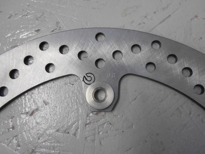 Höger sida på <p>fram, Brembo 320 x 4,45mm, nyckick. okänd modell</p>

<p>Bultcirkel 205mm</p> motorcykel.