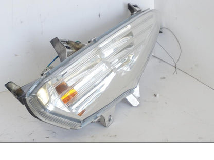 Vänster sida på Blinkers från en Honda SH 300 A -2011 scooter.