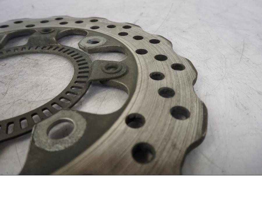 Höger sida på Bromsskiva från en Kawasaki ER-6F -2010 motorcykel.