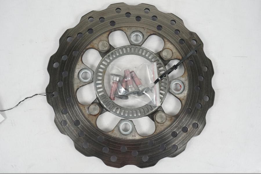 Framsidan på Bromsskiva från en Kawasaki ER-6N ABS -2010 motorcykel.