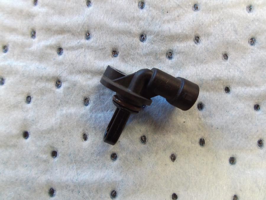 Framsidan på Spjällhus från en H-D Softail Deluxe / Nostalgia FLSTN -2011 motorcykel.