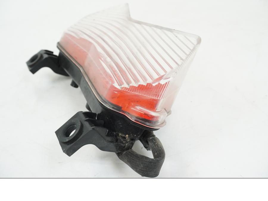 Vänster sida på Baklampa från en Kawasaki Z 750 -2006 motorcykel.