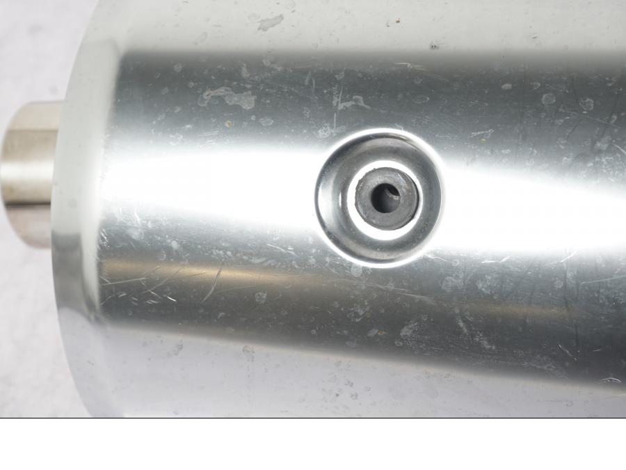 Vänster sida på Ljuddämpare från en Honda CBR 500 R -2013 motorcykel.