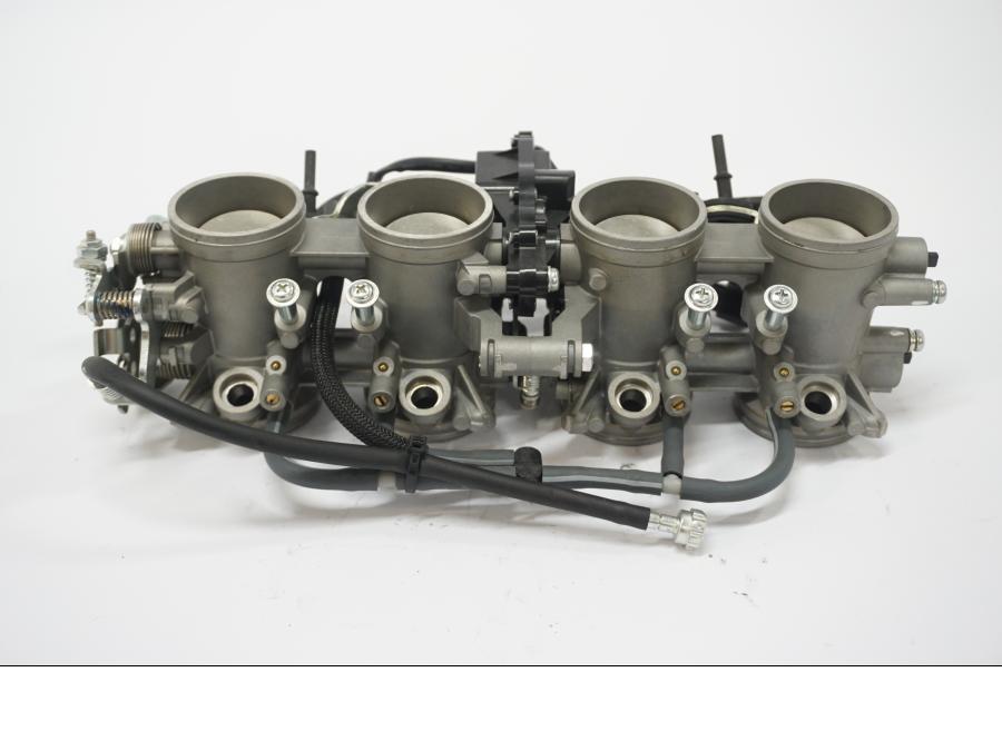 Framsidan på Spjällhus från en Kawasaki Z 900 -2019 motorcykel.