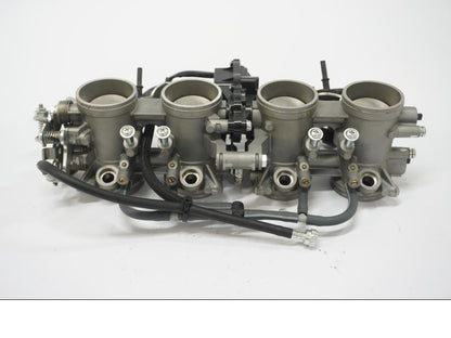 Framsidan på Spjällhus från en Kawasaki Z 900 -2019 motorcykel.