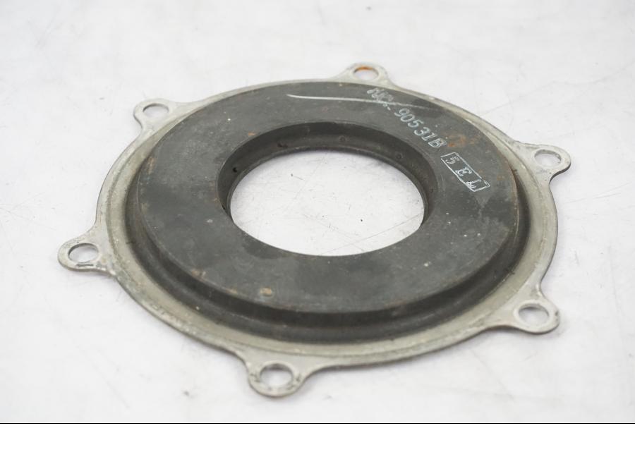 Baksidan på Bromsskivegummidämpare från en Yamaha XVS 1100 -2000 motorcykel.