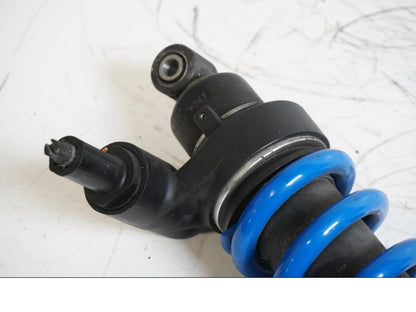 Vänster sida på Stötdämpare från en Triumph Tiger -2007 motorcykel.