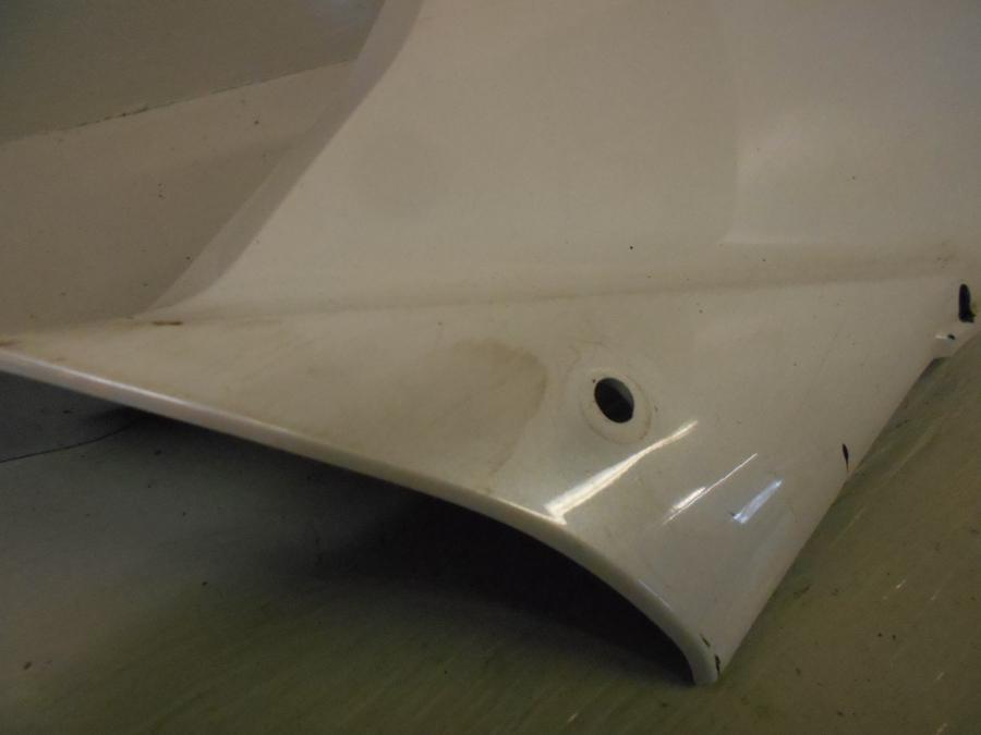 Höger sida på Magkåpa från en Yamaha YZF-R 125 -2012 motorcykel.