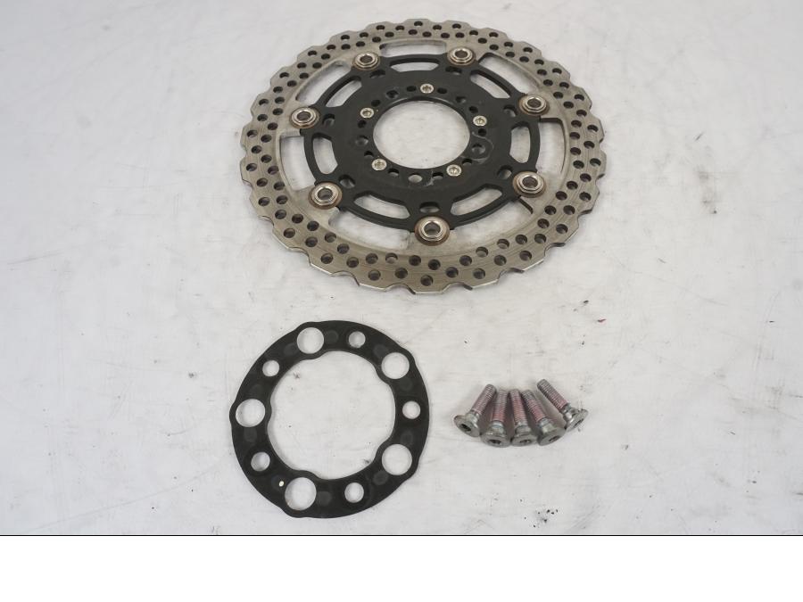 Framsidan på Bromsskiva från en Kawasaki ER-6F -2010 motorcykel.