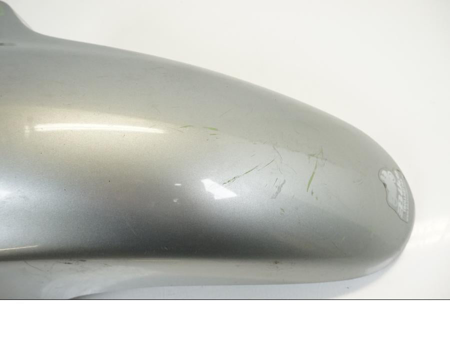 Vänster sida på Framskärm från en Honda XL 650 V -2000 motorcykel.