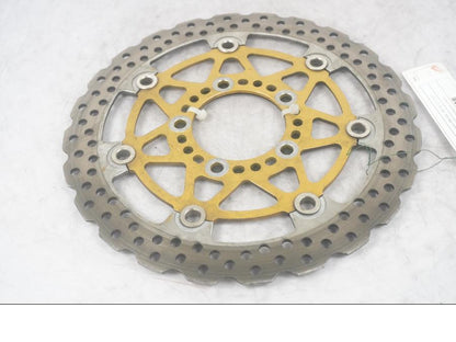 Framsidan på Bromsskiva från en Kawasaki ER-6N -2006 motorcykel.