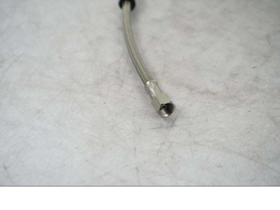 Snett uppifrån på Bromsslang från en Universal Universal -2010 motorcykel.