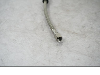 Snett uppifrån på Bromsslang från en Universal Universal -2010 motorcykel.