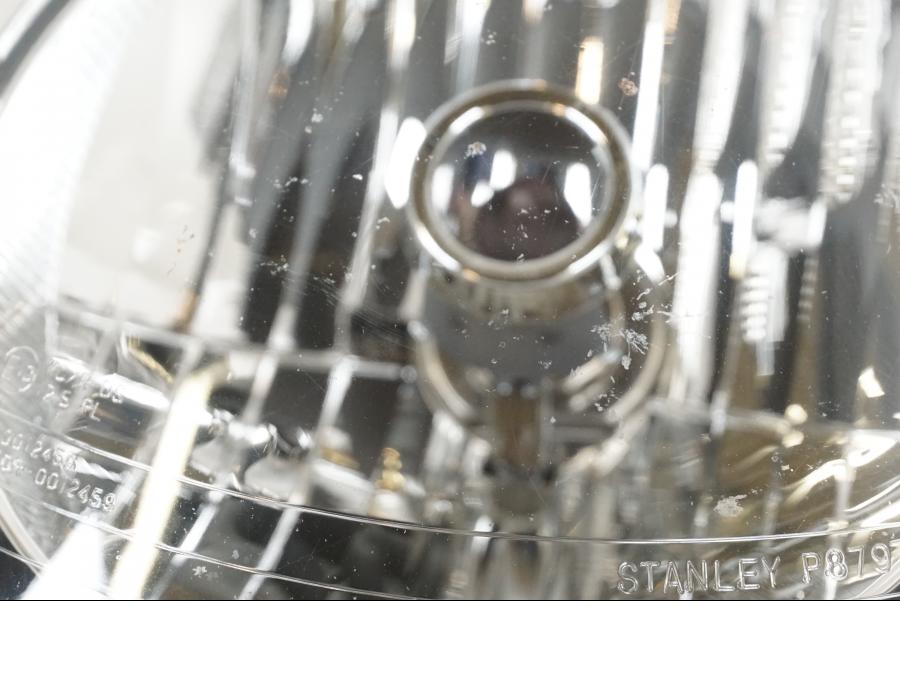 Baksidan på Strålkastare från en Suzuki GSF 1250 -2010 motorcykel.