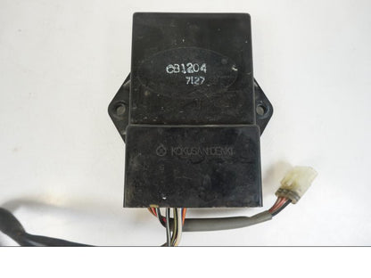 Höger sida på Avgasstyrbox från en Aprilia RS 250 -1998 motorcykel.