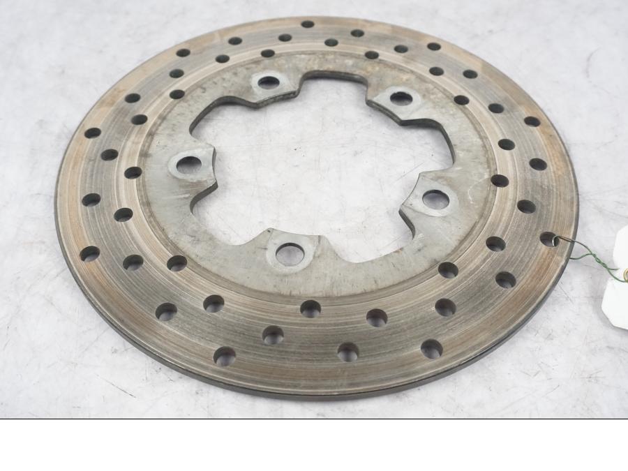 Framsidan på Bromsskiva från en Suzuki TL 1000 S -1997 motorcykel.