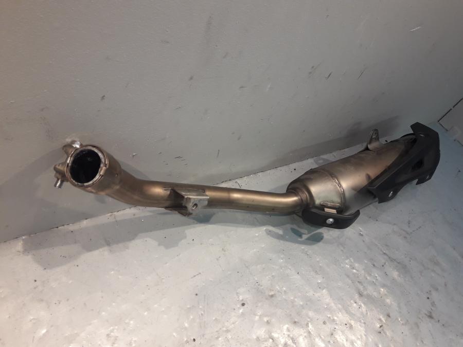 Vänster sida på Ljuddämpare från en Yamaha WR 125 -2010 motorcykel.