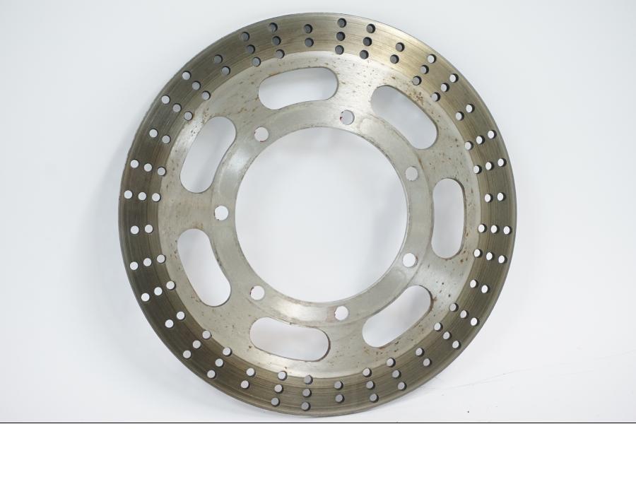 Framsidan på Bromsskiva från en Kawasaki VN 1500 -2002 motorcykel.