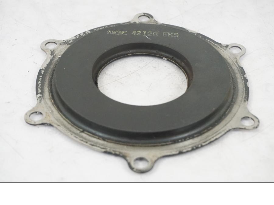 Baksidan på Bromsskivegummidämpare från en Yamaha XVS 1100 -2004 motorcykel.