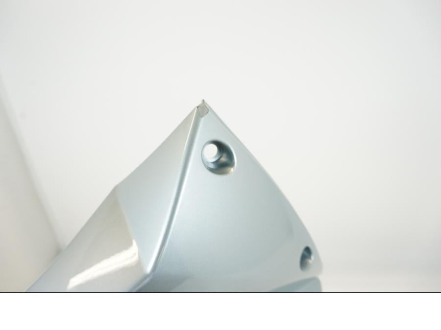 Vänster sida på Sidkåpa från en KTM 950 Adventure -2004 motorcykel.