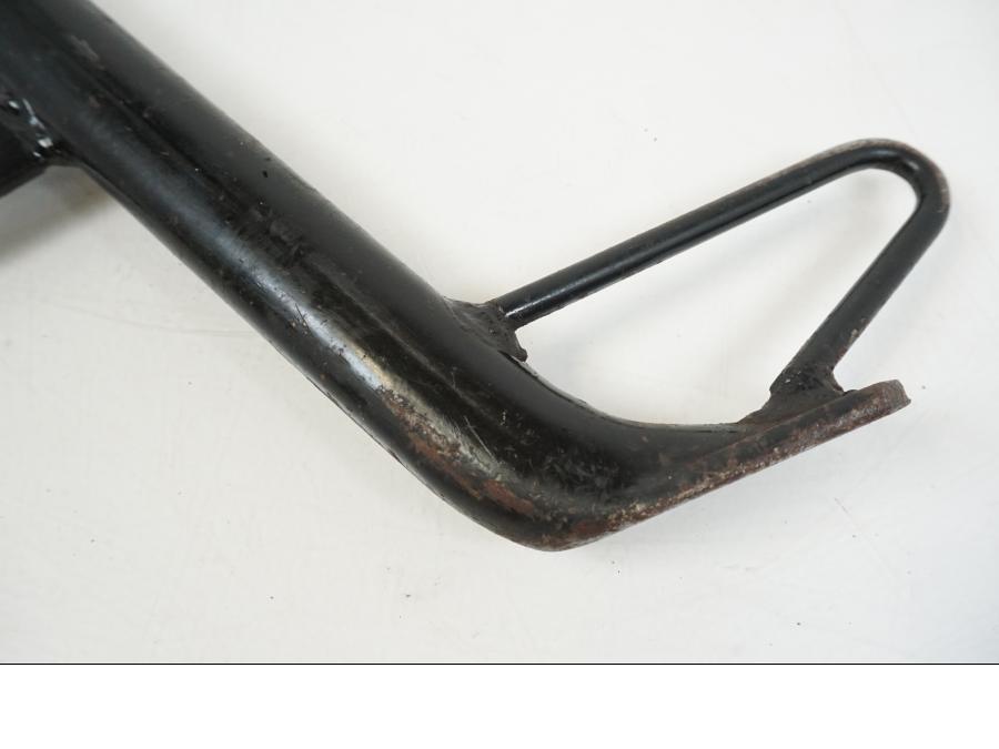 Snett uppifrån på Sidostöd från en Honda CBR 125 R -2006 motorcykel.