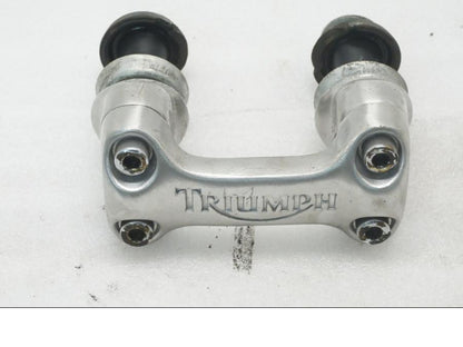 Framsidan på Styrfäste från en Triumph Legend TT -2000 motorcykel.