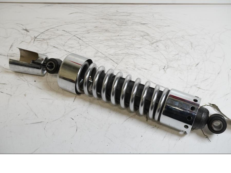 Framsidan på Stötdämpare från en H-D Dyna Street Bob FXDB/I -2013 motorcykel.