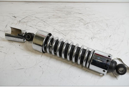 Framsidan på Stötdämpare från en H-D Dyna Street Bob FXDB/I -2013 motorcykel.