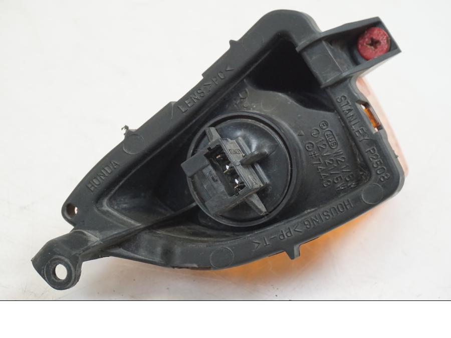 Vänster sida på Blinkers från en Honda VFR 800 -2003 motorcykel.