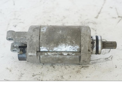 Baksidan på Startmotor från en Honda SH 300 A -2011 scooter.