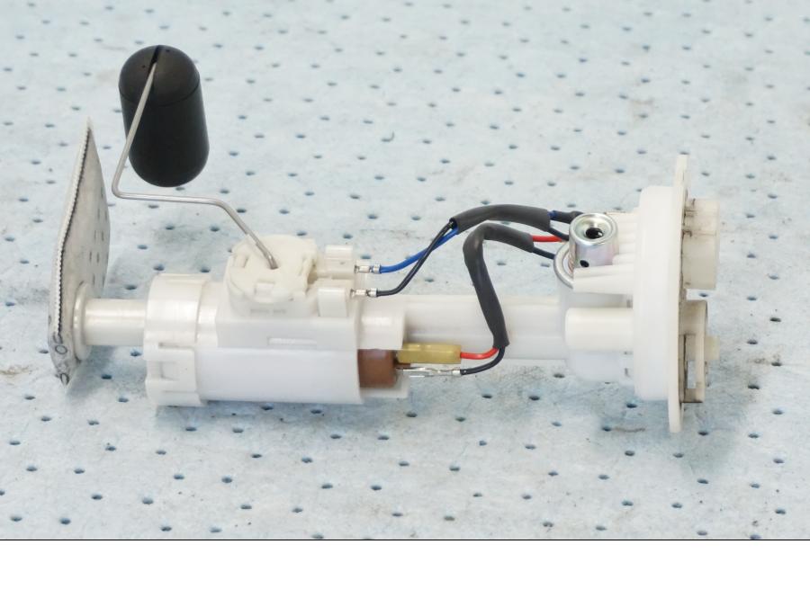 Höger sida på Bensinpump insprut från en Yamaha X-Max 250 -2016 scooter.