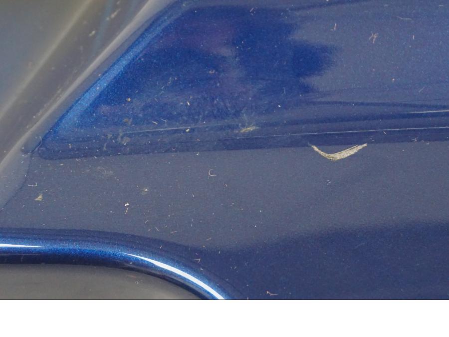 Snett uppifrån på Sidopanel från en H-D Street Glide FLHX -2012 motorcykel.