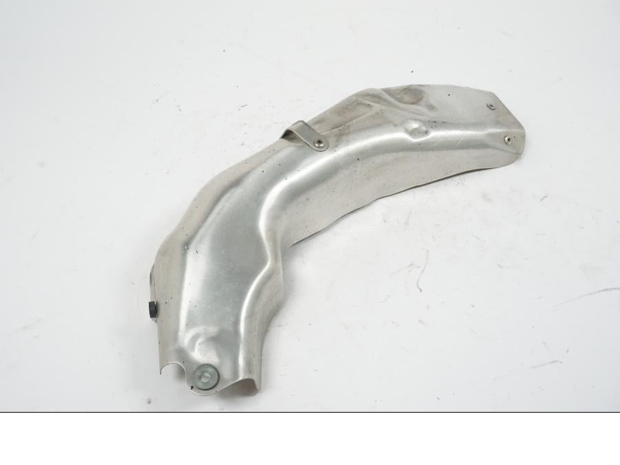 Vänster sida på Värmeskydd från en Honda CBR 1000 RR -2004 motorcykel.