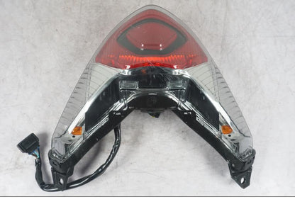 Framsidan på Baklampa från en Honda ANC 125 -2022 scooter.