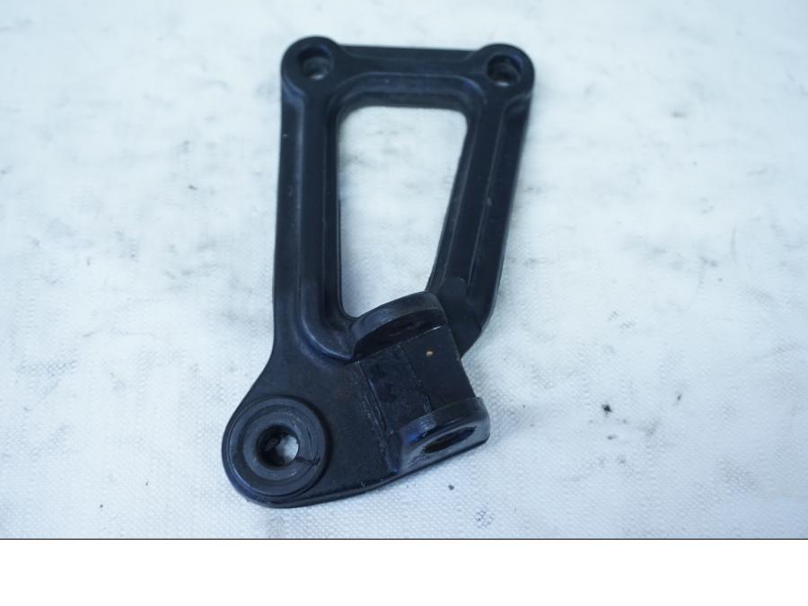 Framsidan på Fotpinnefäste från en Ducati 750 SS -1995 motorcykel.