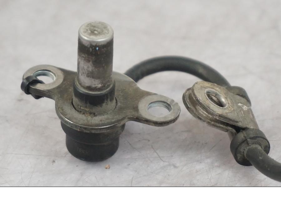 Snett uppifrån på ABS givare från en Triumph Tiger -2009 motorcykel.