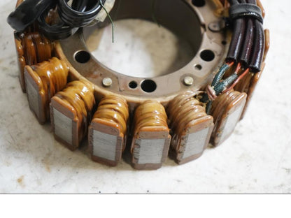 Baksidan på Generator från en Honda XRV 750 -1998 motorcykel.