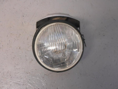 Framsidan på Strålkastare från en H-D FXD Dyna Glide -1992 motorcykel.