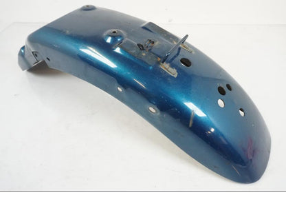 Framsidan på <p>Bakskärm från Suzuki VS 800 1992.</p>

<p>Smårepor, slitage av lack mindre ytrost finns se bilder.</p> motorcykel.