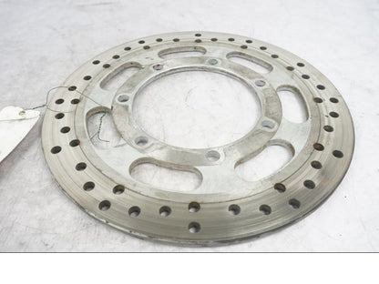 Framsidan på Bromsskiva från en Kawasaki VN 1600 Mean Streak -2004 motorcykel.