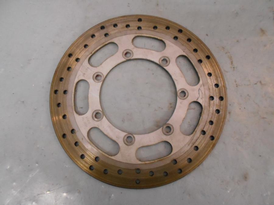 Framsidan på Bromsskiva från en Kawasaki VN 1600 Mean Streak -2007 motorcykel.