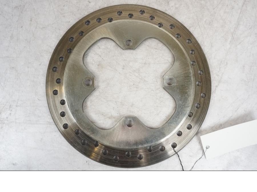 Snett uppifrån på Bromsskiva från en Triumph Tiger -2009 motorcykel.