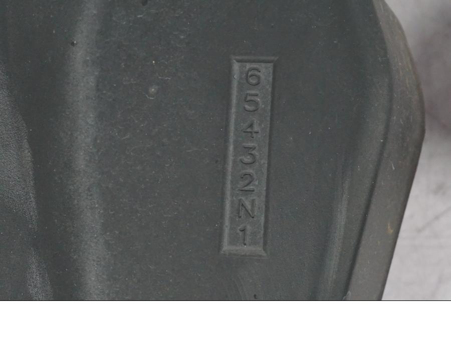 Baksidan på Motorkåpa från en Suzuki GSF 1250 -2010 motorcykel.