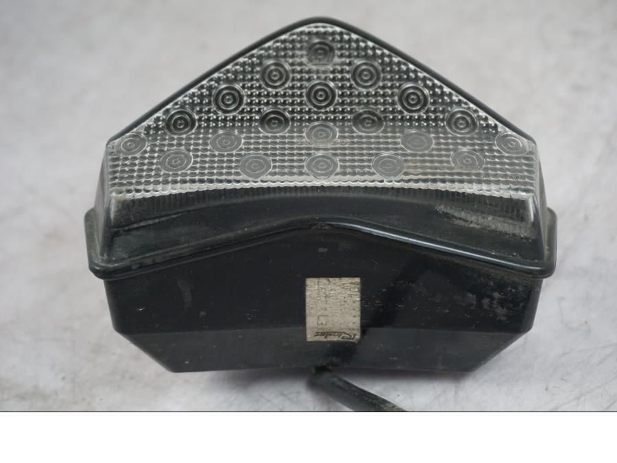 Baksidan på Baklampa från en Triumph Tiger -2009 motorcykel.