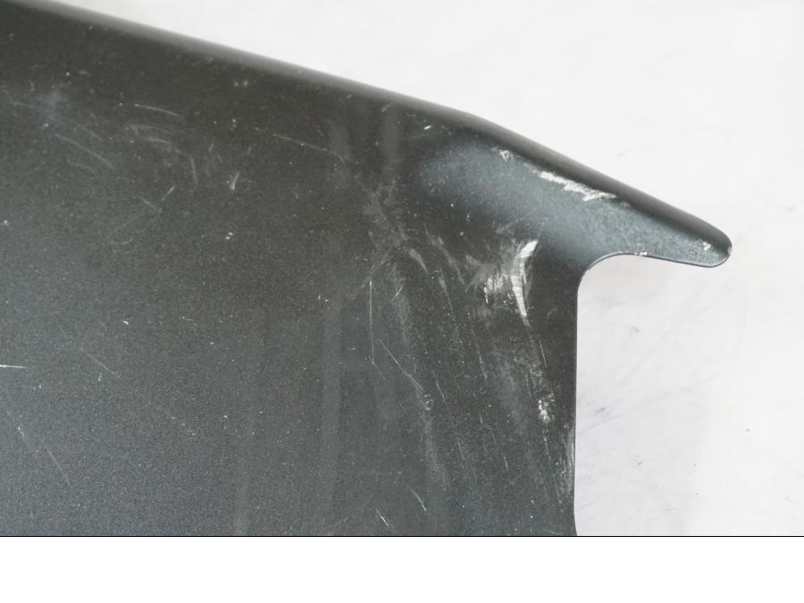 Vänster sida på Värmeskydd från en Kawasaki ZX-6R -2011 motorcykel.