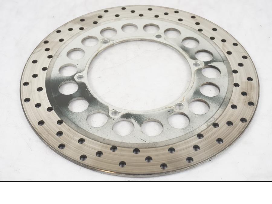 Snett uppifrån på Bromsskiva från en Yamaha XVS 1100 -2000 motorcykel.