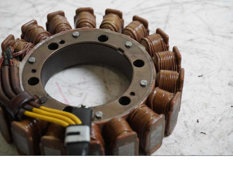 Baksidan på Generator från en Honda XL 650 V -2007 motorcykel.