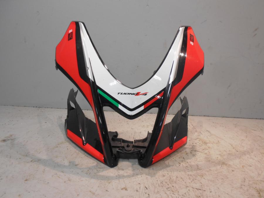 Framsidan på Toppkåpa från en Aprilia Tuono V4R -2016 motorcykel.